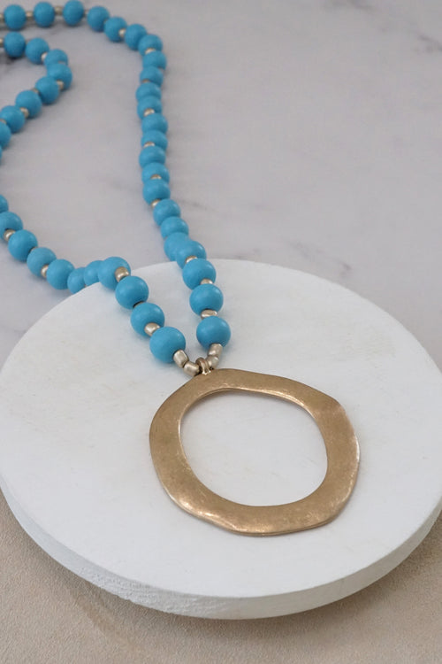 Long Wooden Bead Necklace with gold circle - Turquoise Blue