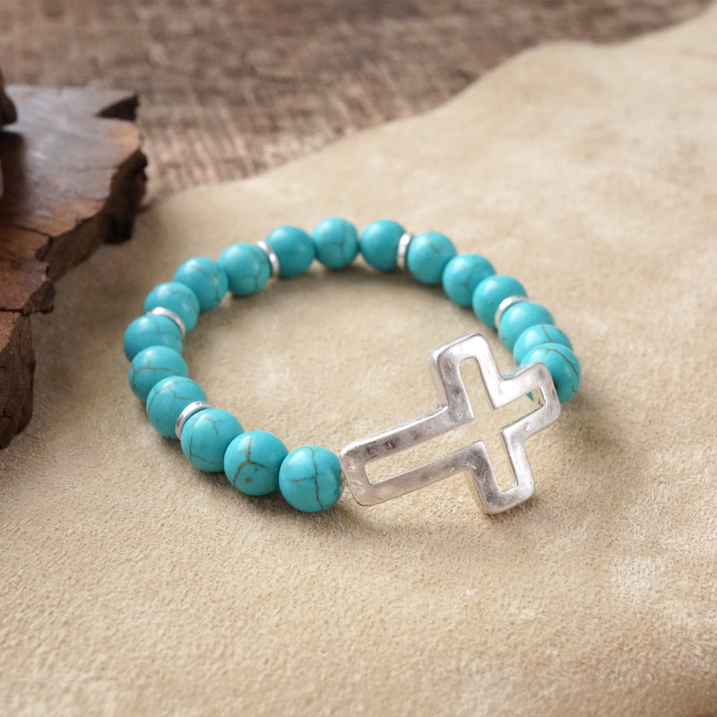 Cross bracelet with Turquoise color beads and silver hammered cross