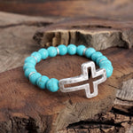 Cross bracelet with Turquoise color beads and silver hammered cross