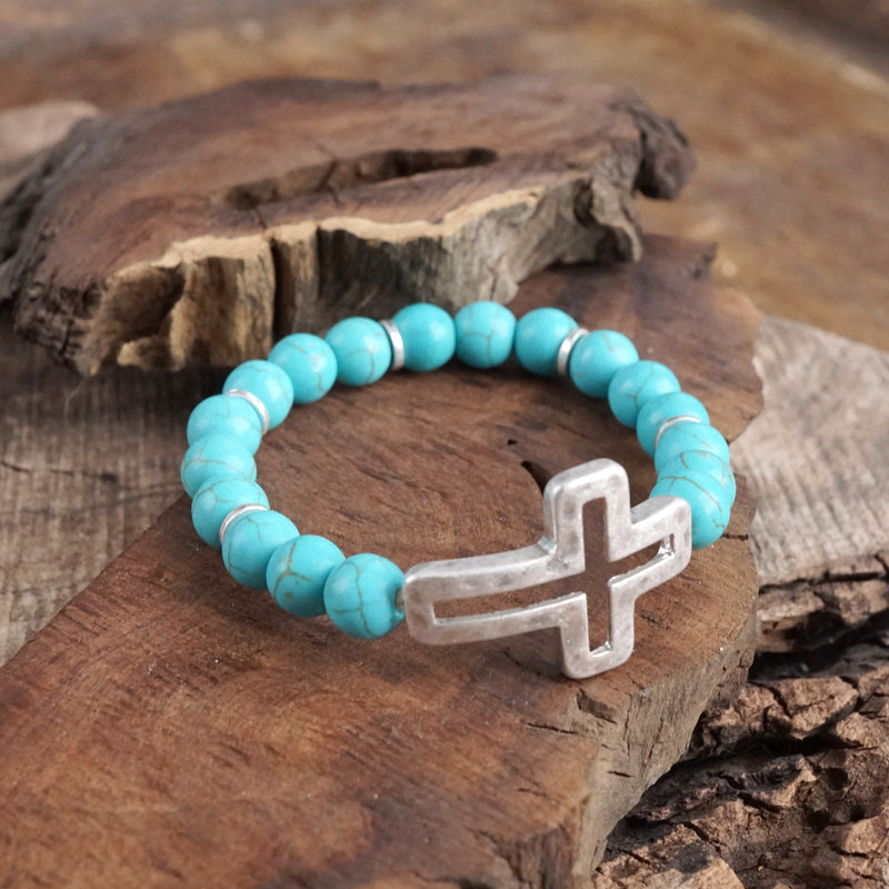 Cross bracelet with Turquoise color beads and silver hammered cross