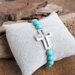 Cross bracelet with Turquoise color beads and silver hammered cross