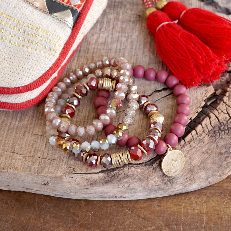 Beaded bracelets set in Red Burgundy with a coin charm