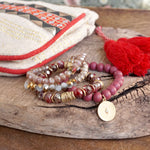 Beaded bracelets set in Red Burgundy with a coin charm