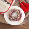 Beaded bracelets set in Red Burgundy with a coin charm