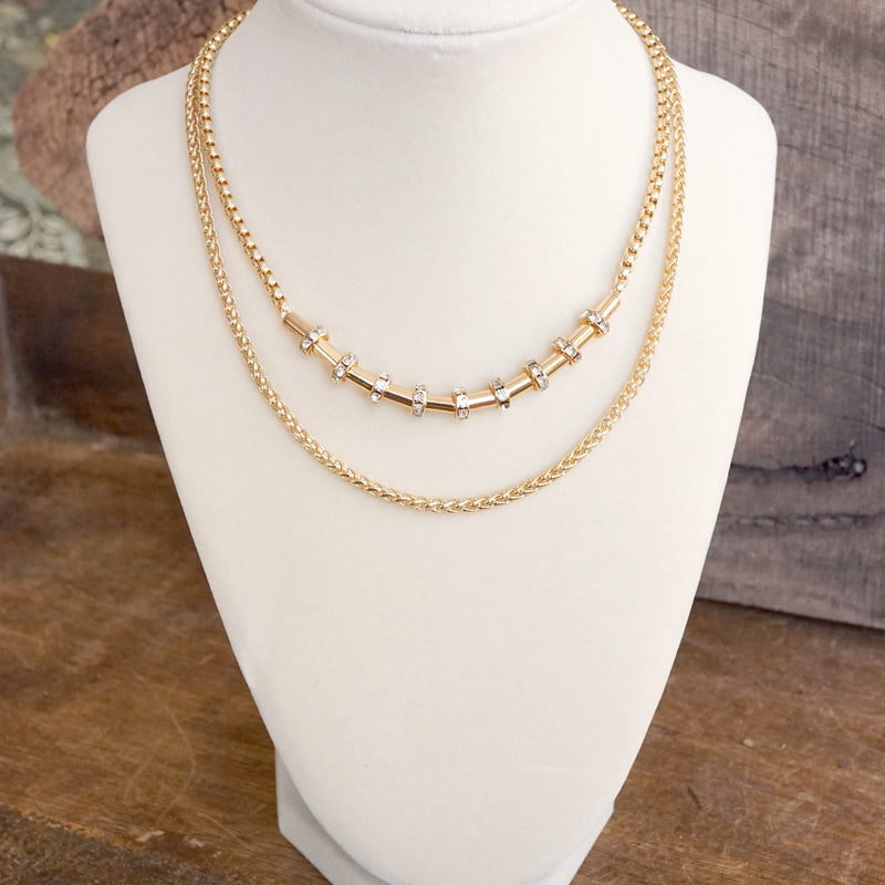 Layered Gold Chain Necklace with Cylinder and Crystal Accents