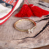 Gold-Tone Stretchy Bangle with Crystal Pave Bow