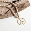 Long Wood Bead Necklace with golden peace sign pendant - Natural Beige