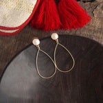 Teardrop with a pearl dangle earrings in gold