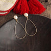 Teardrop with a pearl dangle earrings in gold