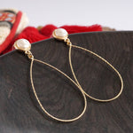 Teardrop with a pearl dangle earrings in gold