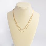 Multi chain short dainty necklace with 3 small pearls in gold tone