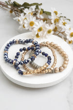 Bracelets stack of 4 piece beaded with Blue Semi Precious stones glass wooden and golden beads