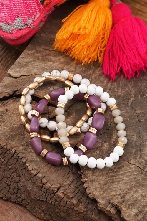 Bracelet Stack of 4 pieces purple and neutrals glass wood and acrylic beads