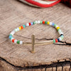 Minimal Sideways Cross Bracelet with Glass Beads Gold tone