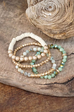Bracelets stack of 4 piece beaded with Green Semi Precious stones glass wooden and golden beads