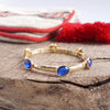 Jeweled Golden Bangle - with Faceted glass oval Christmas colorful jewels