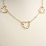 Wire-Inspired Hearts Necklace – Gold Tone