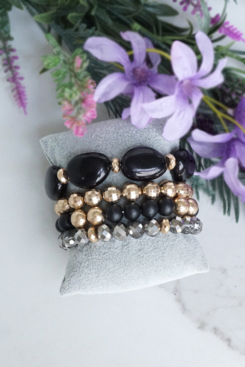 Black and Gold Bracelet Stack of 4 pieces Glass Metal and Acrylic beads
