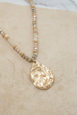 Long Beaded Necklace with Golden Teardrop Pendant - Neutrals