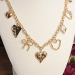 Multi-Charm Heart Necklace – Gold Tone