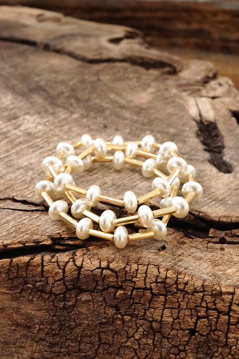 Floating pearls bracelets set with Golden tube beads