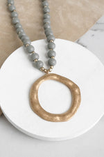 Long Wooden Bead Necklace with gold circle - gray