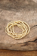 Gold tone multi size beaded bracelet stack of 6 bracelets