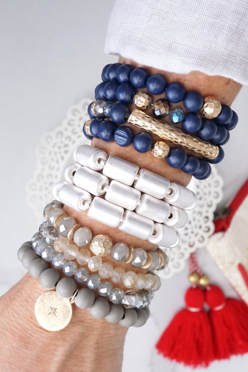Beaded bracelets set in Wooden Navy Blue and Gold tube