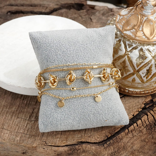 Chain Reaction – Multi-Layer Bracelet Stack in Gold Tone