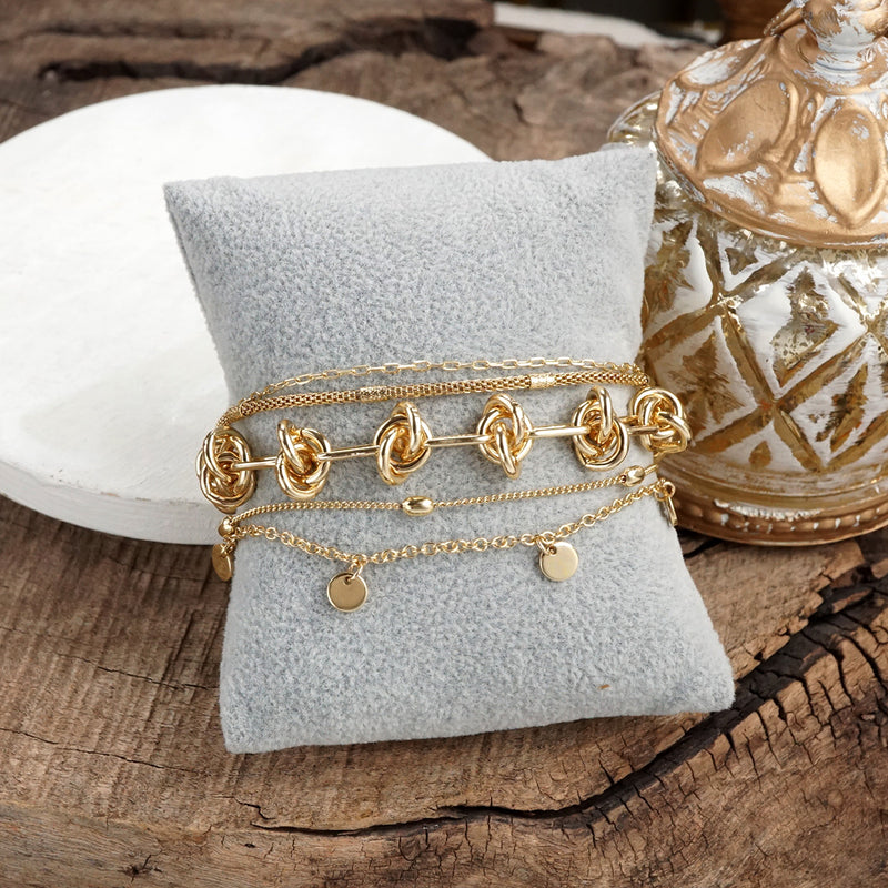 Chain Reaction – Multi-Layer Bracelet Stack in Gold Tone