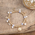 Charmed Harmony – Chinoiserie &amp; Gold Multi-Charm Stretch Bracelet