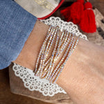 Stretchy Bracelets Stack with Iridescent Rhinestones in Gold Tone