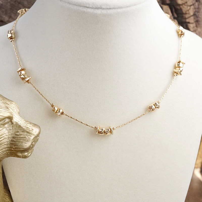 Golden Glimmer – Dainty Station Necklace with Beads