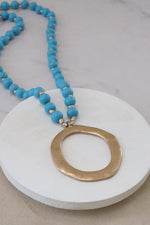 Long Wooden Bead Necklace with gold circle - Turquoise Blue