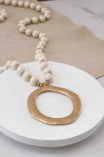 Long Wooden Bead Necklace with gold circle - Cream