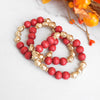 Red Beaded bracelets stack wood and metal Gold tone beads