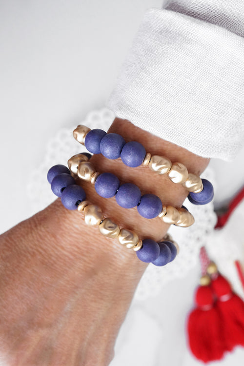 Blue Beaded bracelets stack wood and metal Gold tone beads