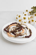 Brown stack of 5 clay and wood beads bracelets in browns and white