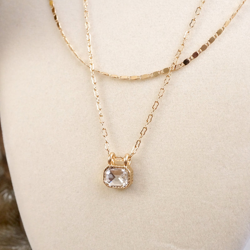 Glimmered Layers – Double Chain Necklace with Emerald-Cut Crystal