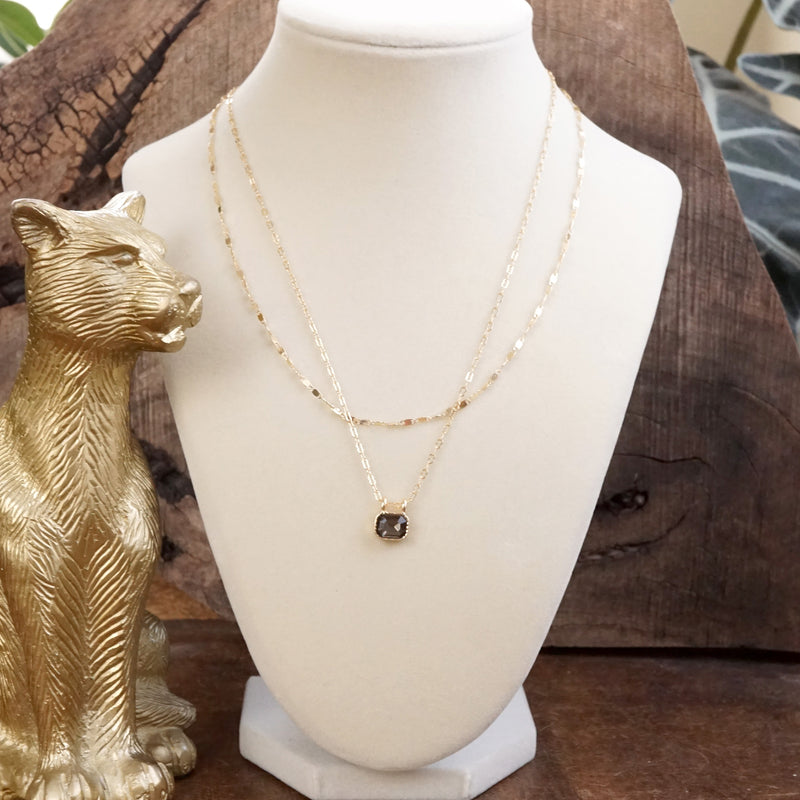 Glimmered Layers – Double Chain Necklace with Emerald-Cut Crystal