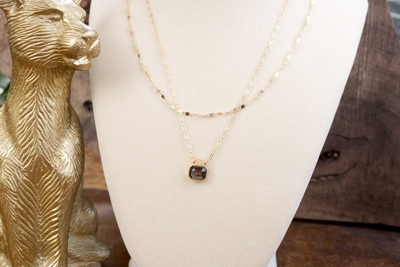 Glimmered Layers – Double Chain Necklace with Emerald-Cut Crystal