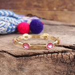 Jeweled Golden Bangle - with Faceted glass oval colorful jewels