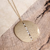 Long Worn Gold Hammered Disc Necklace with Crystal Accents