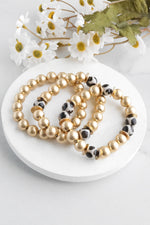Gold beads bracelet stack of 3 with ceramic animal print beads