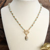 Faceted Beads & Oval Stone Front Toggle Necklace – Gold Tone