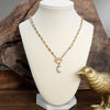 Faceted Beads & Oval Stone Front Toggle Necklace – Gold Tone