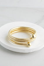 Gold tone multi layer flexy coil bracelet bangle Snake chain