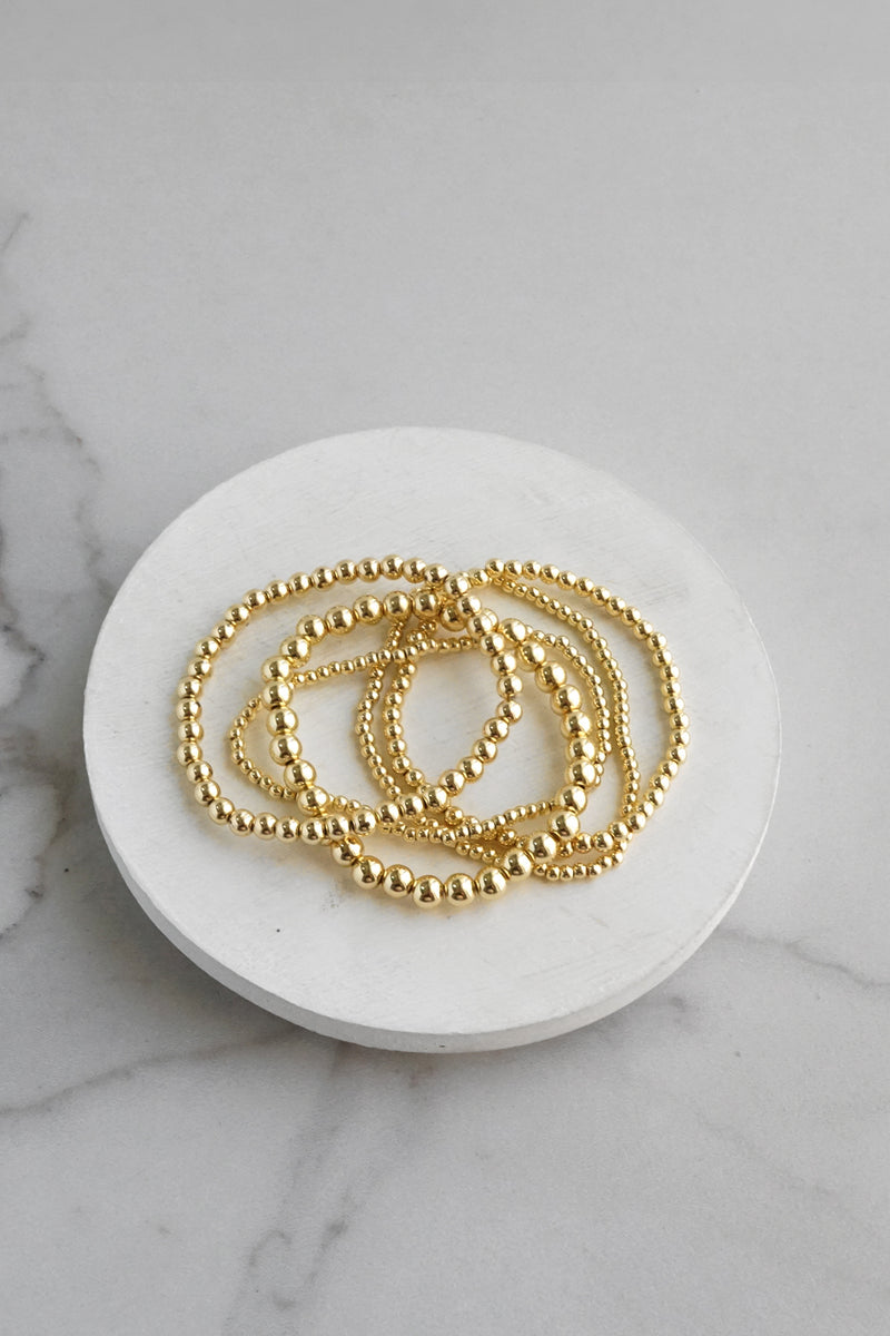 Gold tone multi size beaded bracelet stack of 5 bracelets