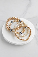 Beaded Bracelets Set of 4 bracelets animal print glass metal wood beads neutrals