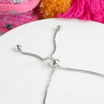 Cross charm friendship adjustable bracelet in Silver tone and crystals